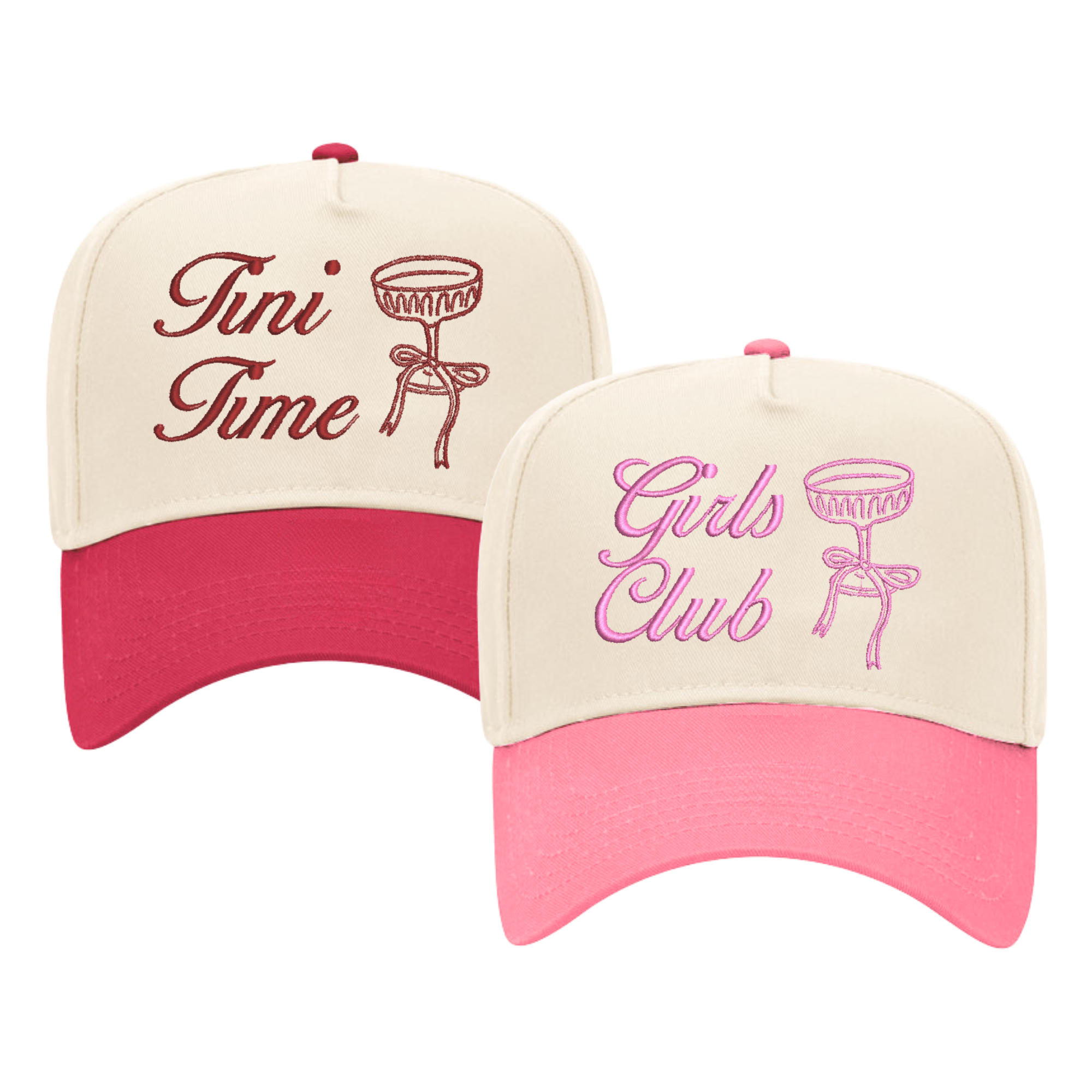 A set of two customized trucker hats featuring the "Girls Club" design in red and pink font. One hat has a red brim and red embroidery, while the other has a pink brim and pink embroidery. Both designs feature a chic champagne glass illustration with a bow detail.