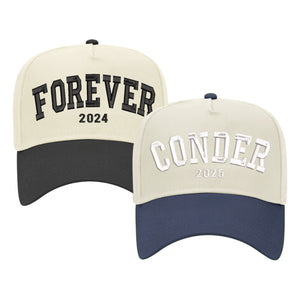 Image of two baseball caps with customized embroidery. The left cap has a cream crown with a black bill, embroidered with 'FOREVER 2024' in bold black letters. The right cap also has a cream crown but with a navy blue bill, featuring 'CONDER 2025' in silver letters. Both caps have a structured design with adjustable snaps at the back, ideal for personalized events or milestones."