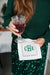 Two monogrammed cocktail napkins are laid out on a white background to show off some of the customization options.