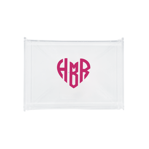 A chic and modern clear acrylic tray featuring a personalized monogram design in bold pink, styled within a heart shape. The monogram "HMR" is prominently showcased, making this tray a standout item for gifting or adding a customized touch to any space. Part of a coordinated set, this acrylic tray is both functional and decorative, embodying a perfect blend of minimalism and personalization. Ideal for organizing essentials or displaying keepsakes, this piece brings elegance and individuality to your home de