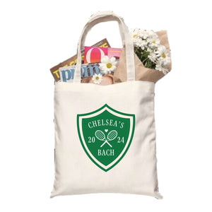 A cotton tote bag is customized with a green Last Swing Before The Ring design.