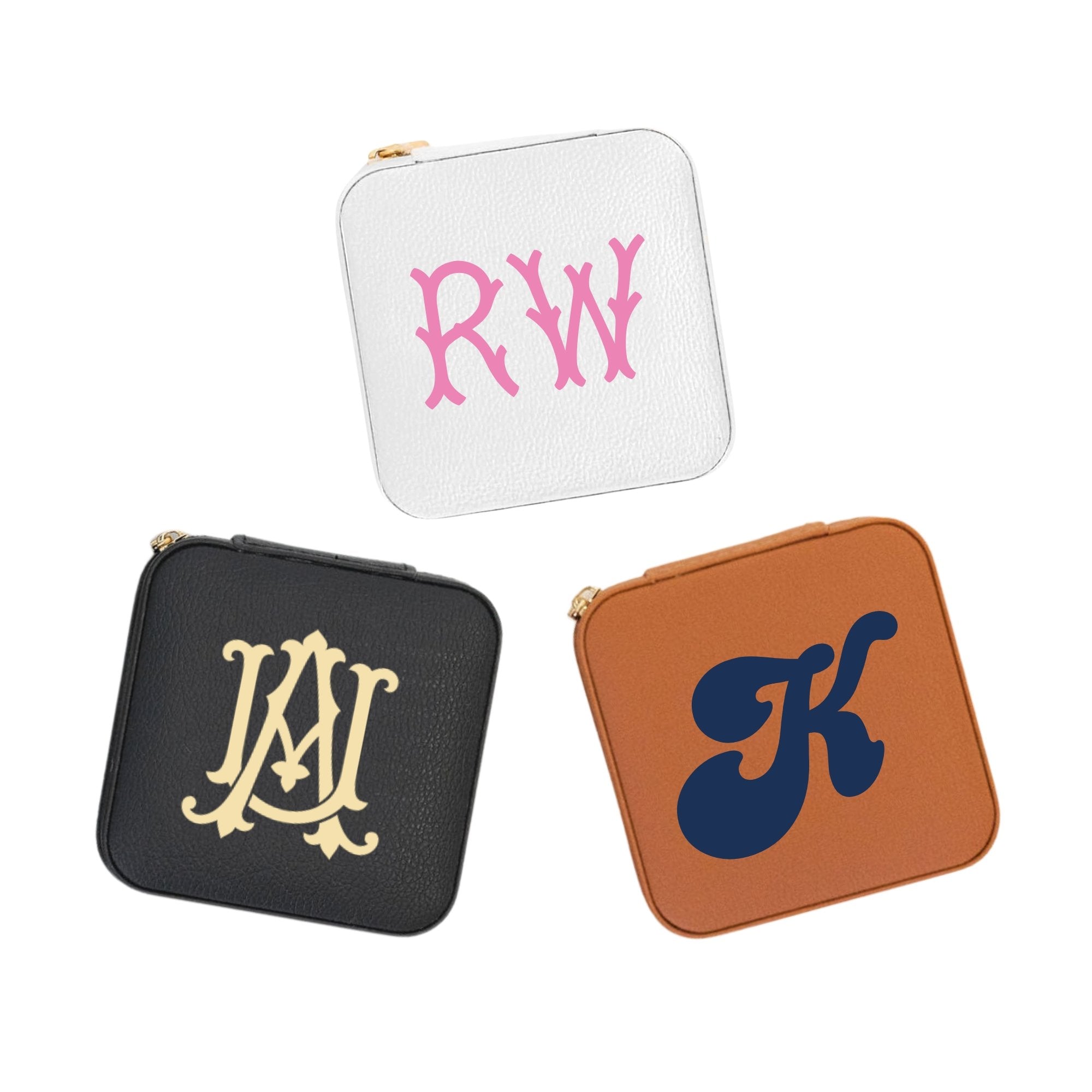 A white monogrammed jewelry case featuring our custom fishtail monogram and showing the storage on the inside.