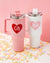 Drink tumblers customized with a monogrammed heart design