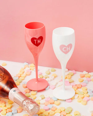 Monogrammed champagne flutes show off their Valentine's design