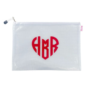 A white pouch featuring monogrammed heart design in red