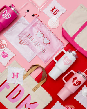 An assortment of pink and red products is laid out for Valentine's inspiration