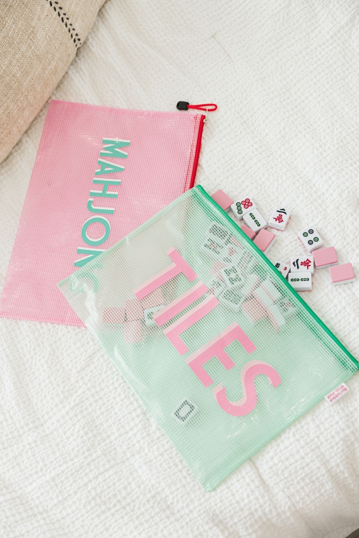 Pool bags that read fun Mahjong phrases on them