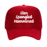 A red trucker hat reads "Star Spangled Hammered" in white script